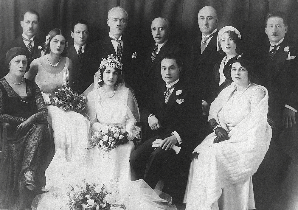 A Nashashibi family wedding, Jerusalem, 1929. Back row, left to right: Mrs. Joseph Albina (seated), Fakhri Nashashibi (standing), Ibrahim Nashashibi (standing), Raghib Nashashibi, Fahmia Nashashibi, Joseph Albina, Miss Albina (niece of Joseph Albina), Ismail Nashashibi. Front row, left to right: Emily (the daughter of Madame Nashashibi from a previous marriage that ended in divorce, in Turkey), Azmi Baker Nashashibi (cousin of Raghib Bey), Madame Nashashibi
