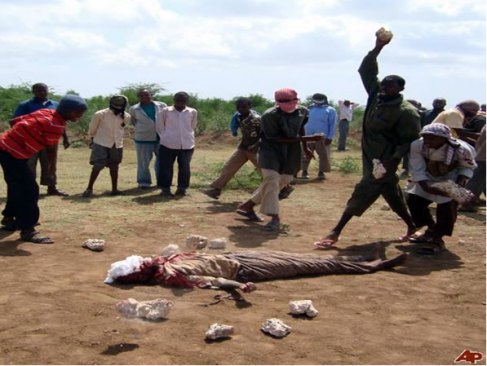 An adulterer being stoned to death for adultery in Somalia